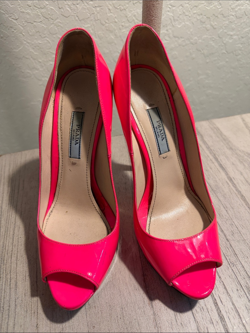 Prada Neon Pink Patent Peep-Toe Heels soles coming up and several scuffs/peeling